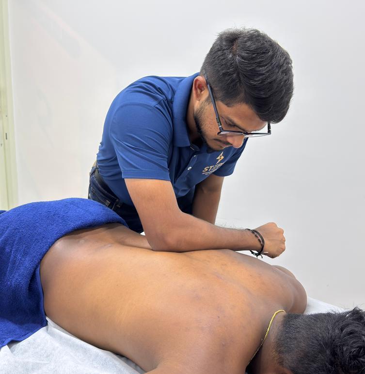 Therapist providing a sports massage